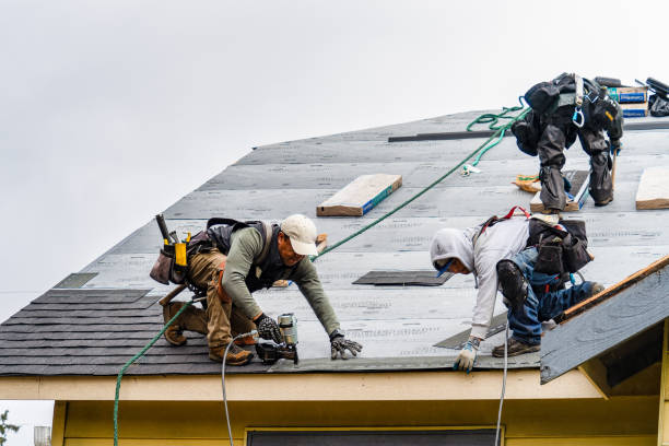 Professional Gutter Installation technician working in Middleton, MA